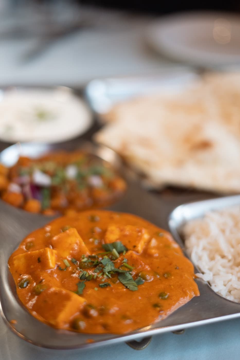 Matar paneer curry with rice and naan at Jewel of India Seattle